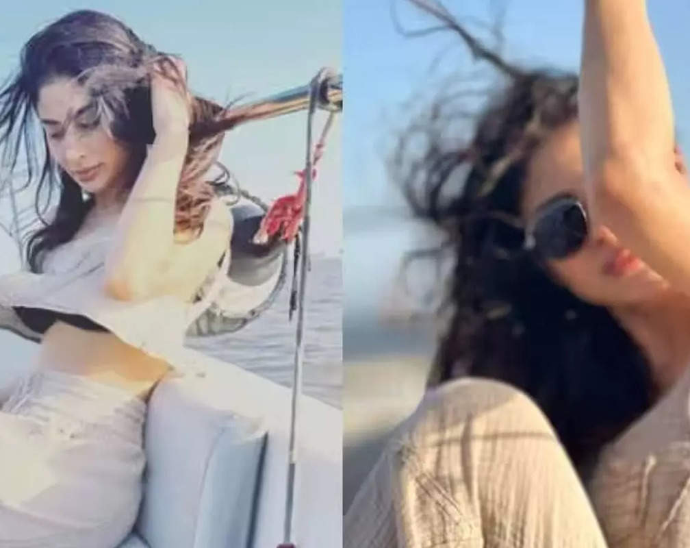 
Mouni Roy flaunts washboard abs in beige co-ord set as she enjoys yacht ride; Disha Patani reacts
