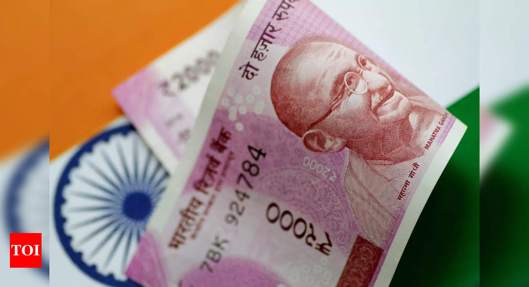 Rupee firms to key level as dollar falters after US inflation – Times of India