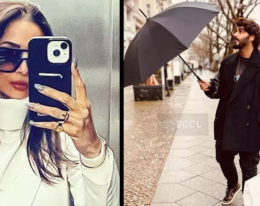
Trolled! Arjun Kapoor poses for Malaika Arora on the streets of Berlin; netizens say 'Baby always looks fine with Mama'
