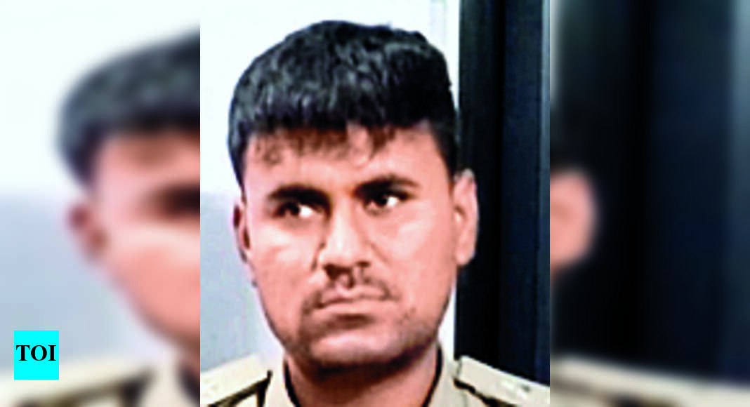 Man Posing As Cop Caught In Halol | Vadodara News - Times of India