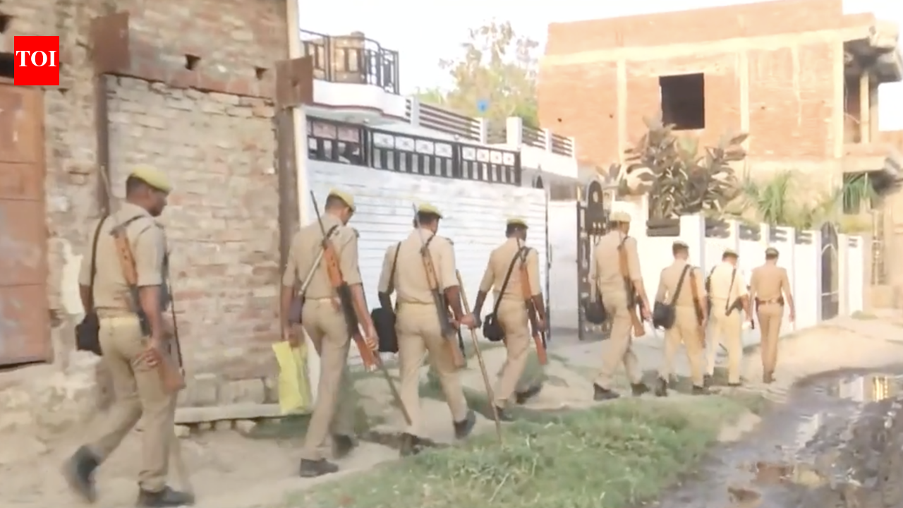 Atiq Ahmad killing: UP Police conduct flag march in Mariyadeeh, village ...