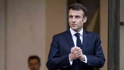 Macron seen singing in the streets after pensions address