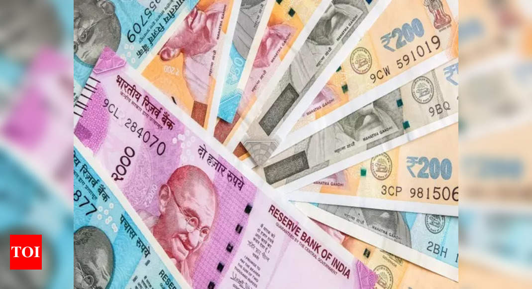 Rupee hits over 2-week low as US yields firm, premiums drop – Times of India