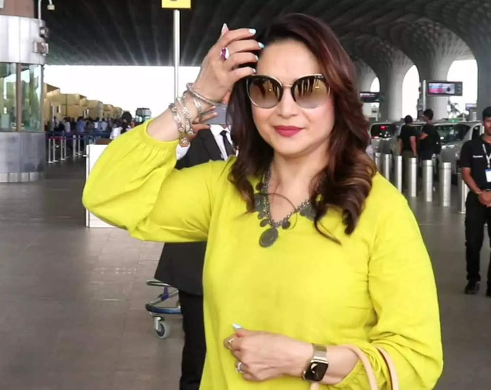
55-year-old Madhuri Dixit redefines elegance in a yellow kurta
