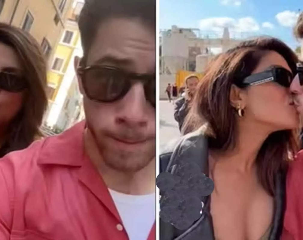
'When in Rome, Do as the Romans Do' - Priyanka Chopra and Nick Jonas share a passionate kiss as they roam around Colosseum
