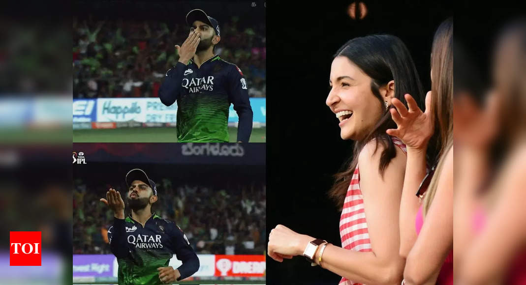Virat Kohli gives flying kisses to Anushka Sharma as RCB wins against RR, netizens can’t stop gushing over the couple – Times of India