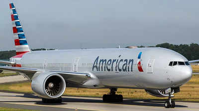 Drunk Indian urinates on co-passenger on American Airlines