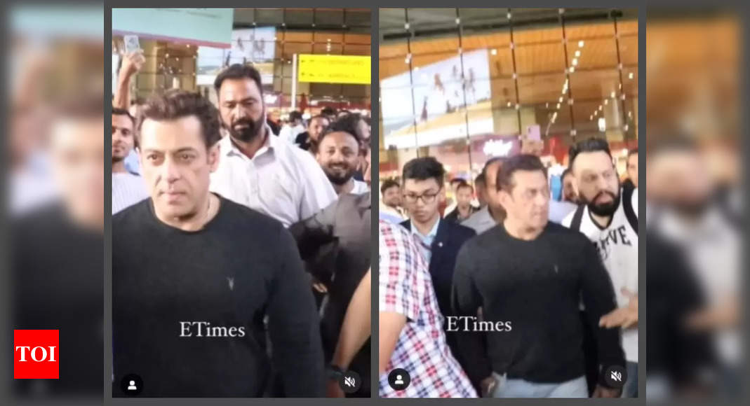 Salman Khan looks upset after fan tries to shake hands with him; bodyguard Shera pushes him – WATCH video – Times of India