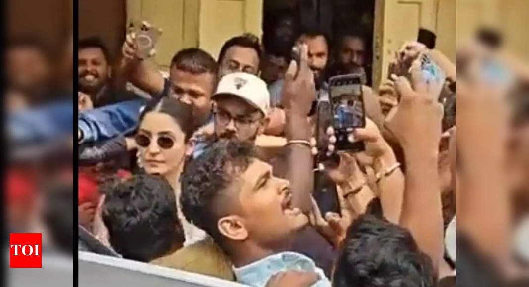 Virat Kohli loses his cool as a fan tries to get close to Anushka Sharma for a selfie – WATCH video – Times of India