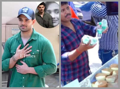 Sooraj distributes sweets to the paparazzi