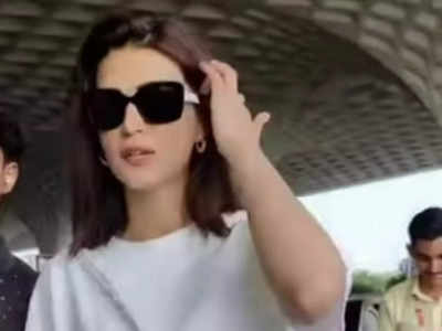 Kriti Sanon beats the heat in an uber-casual look as she heads to Pune for 'The Crew' shoot
