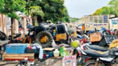 Road linking Flower Bazaar, Chennai Central railway station taken over by parked vehicles, huts