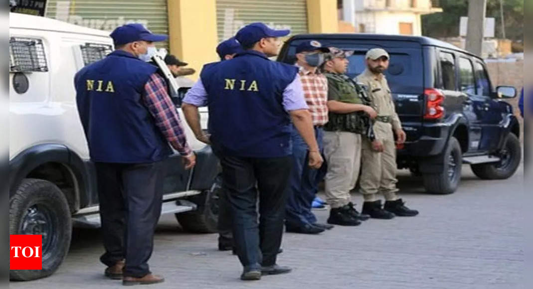NIA searches at 14 sites to bust Red revival plot | India News – Times of India