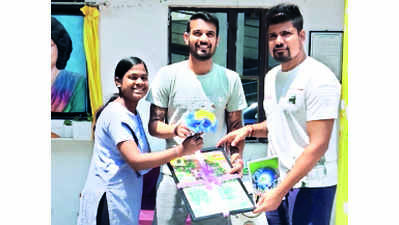RCB teammates celebrate victory with special kids