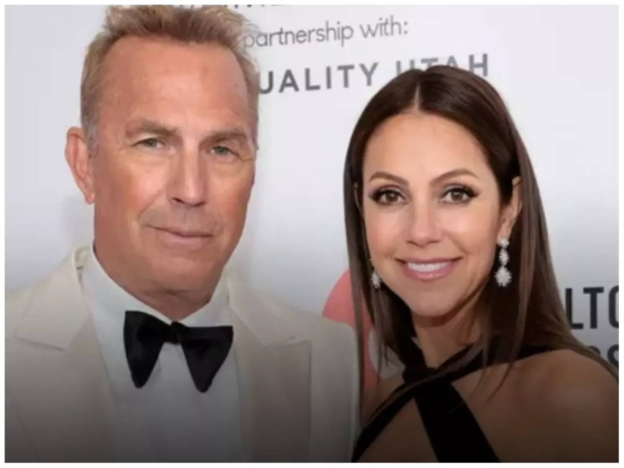 Actor Kevin Costner and his wife, Christine Baumgartner attend the