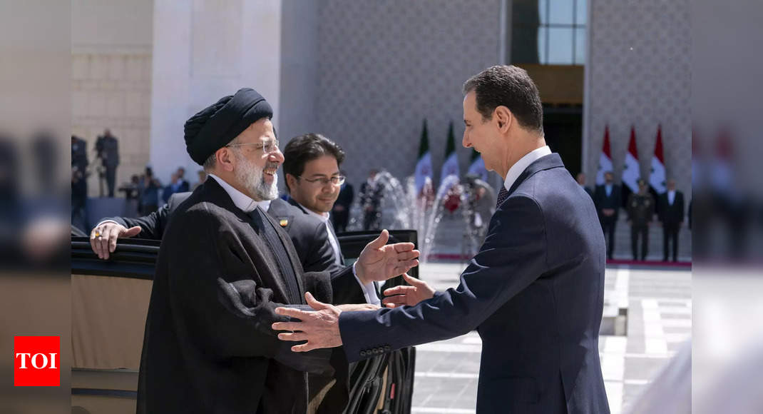 Iran’s president Raisi holds rare meeting with Assad in Syria