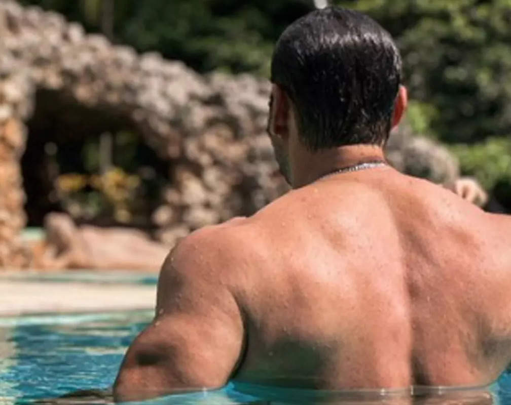
Salman Khan flaunts his back muscles and triceps as he drops his shirtless picture taking a dip in the pool; fans react
