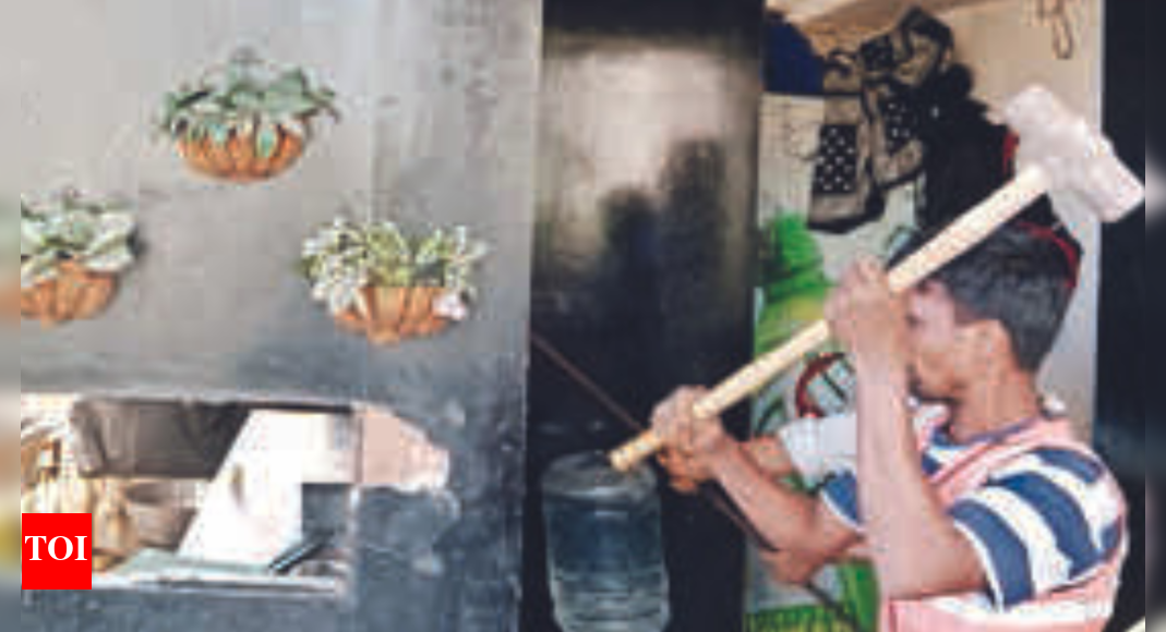 BMC razes illegal rooftop hookah parlour in Malad Mumbai News Times