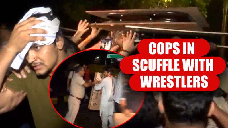 Scuffle between protesting wrestlers and Delhi Police personnel at ...