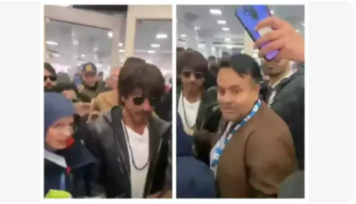 Fan who got turned down by Shah Rukh Khan at airport spotted again; this time trying to get clicked with Backstreet Boys
