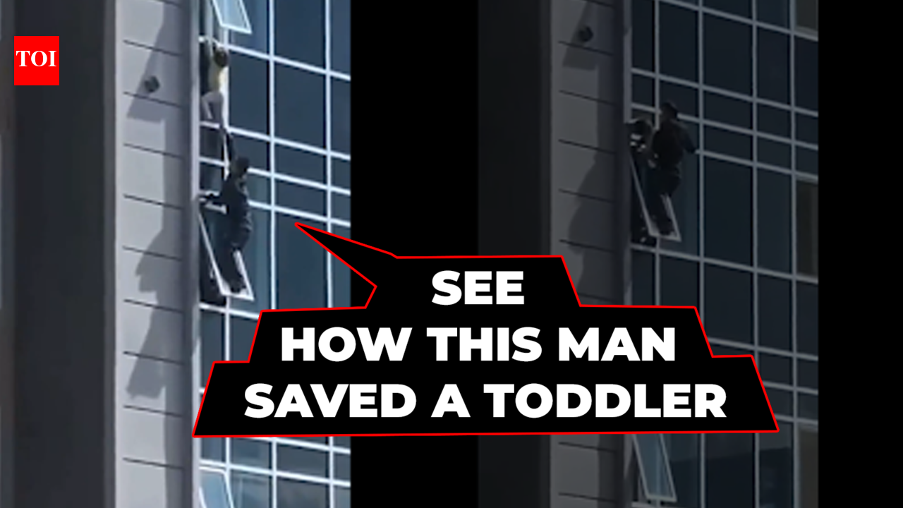 Breathtaking Video: Man climbs out of 8th-floor apartment window to ...