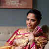 Anasuya Bharadwaj's alluring red rose adaptation for a festive saree is worth watching