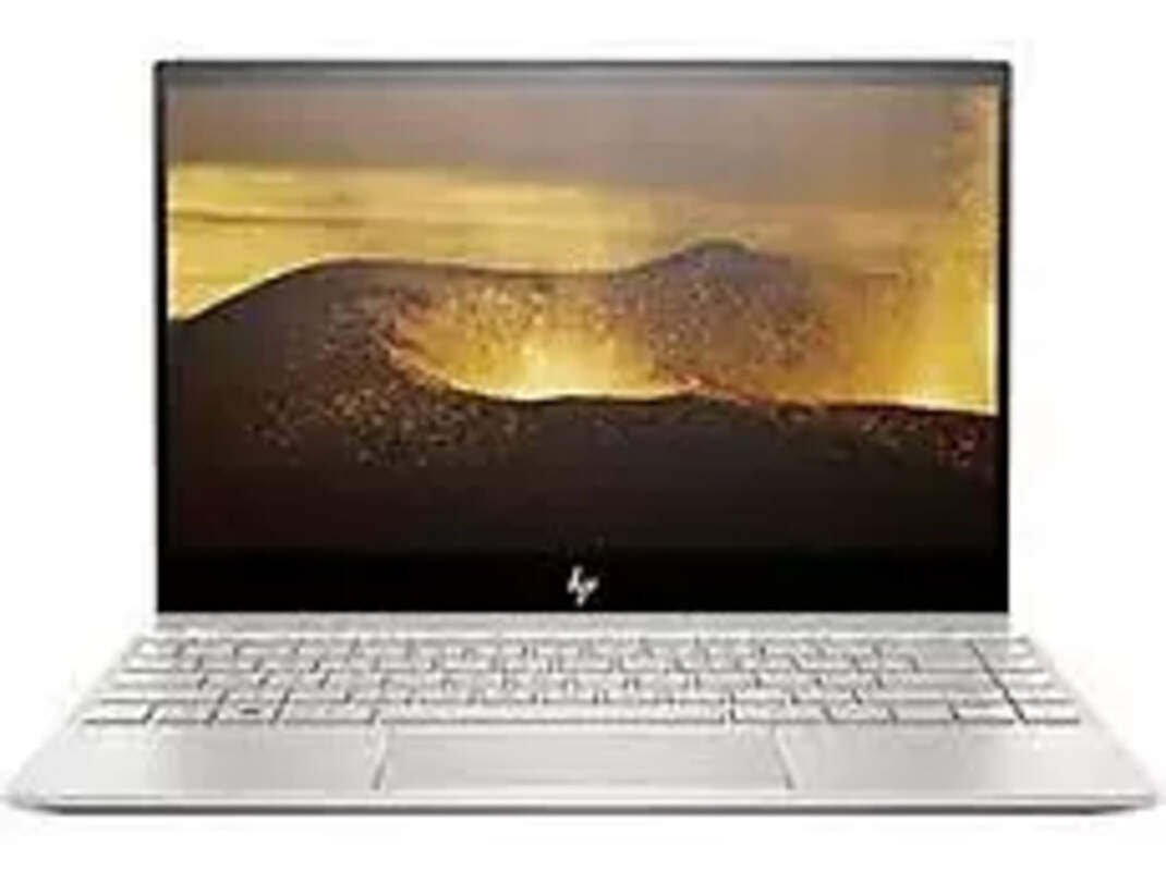 Compare HP ENVY 13bd0521TU Laptop Intel Core i7 11th Gen1165G7