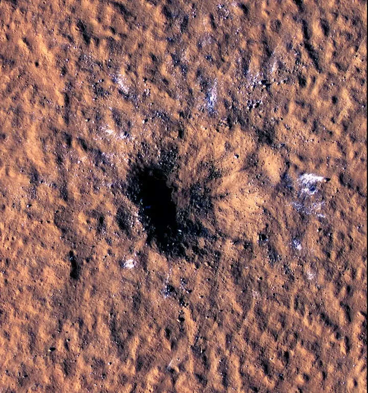 NASA's Mars lander captures stunning meteoroid impact, spots more ice