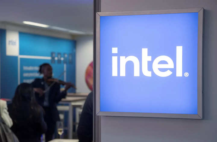 Intel lowers full-year forecast, battered stock rises