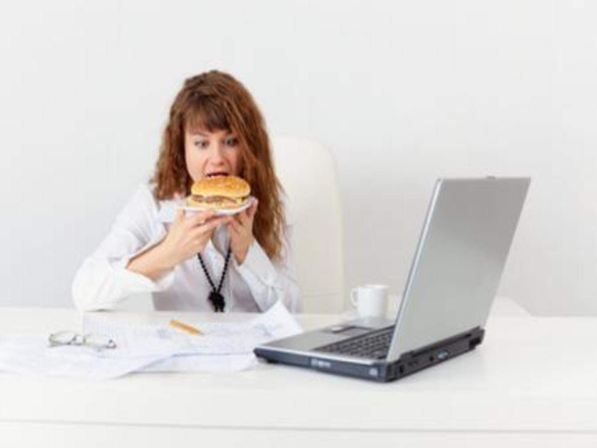 Can I eat my office lunch at my desk? - Times of India