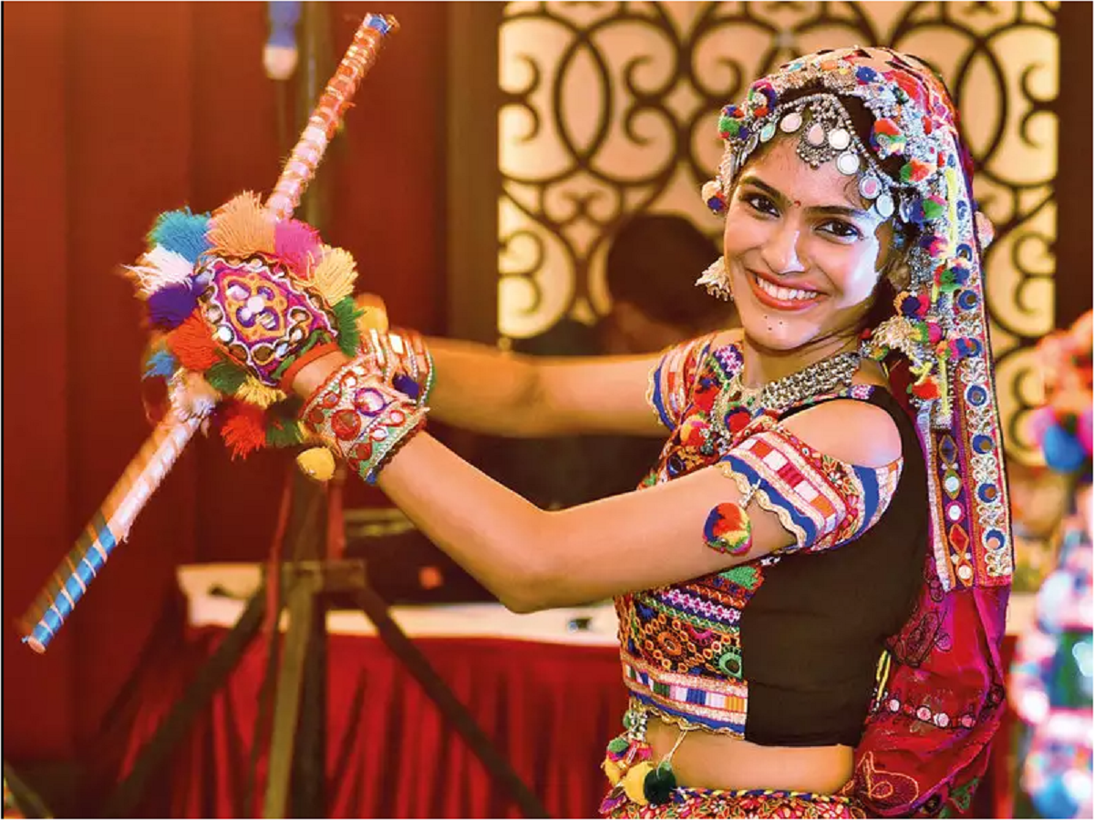 Image of Beautiful Indian Woman in Traditional Dress At Garba Dandiya Raas  Event as a Part Of Durga Navratri-FN914430-Picxy