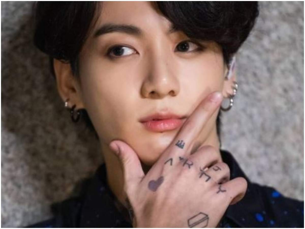 Why did Jungkook get a tattoo with the word ARMY but with a J on top of  the M  Quora