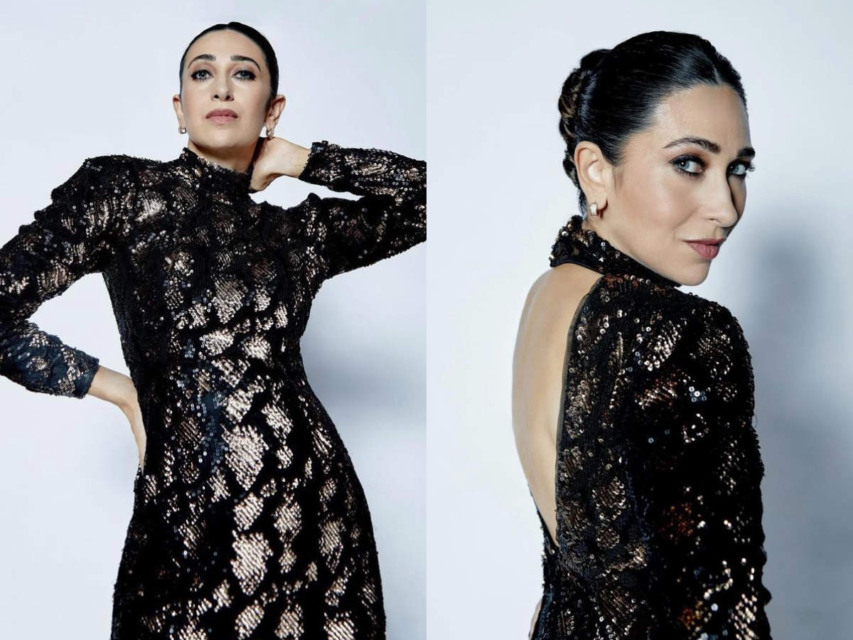 Karisma Kapoor shines in a midi dress | - Times of India
