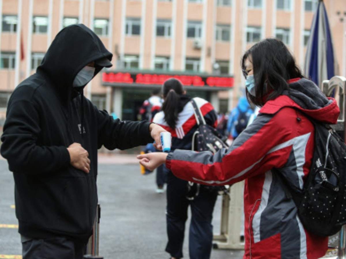 Coronavirus: Beijing announces wearing masks outdoors not ...