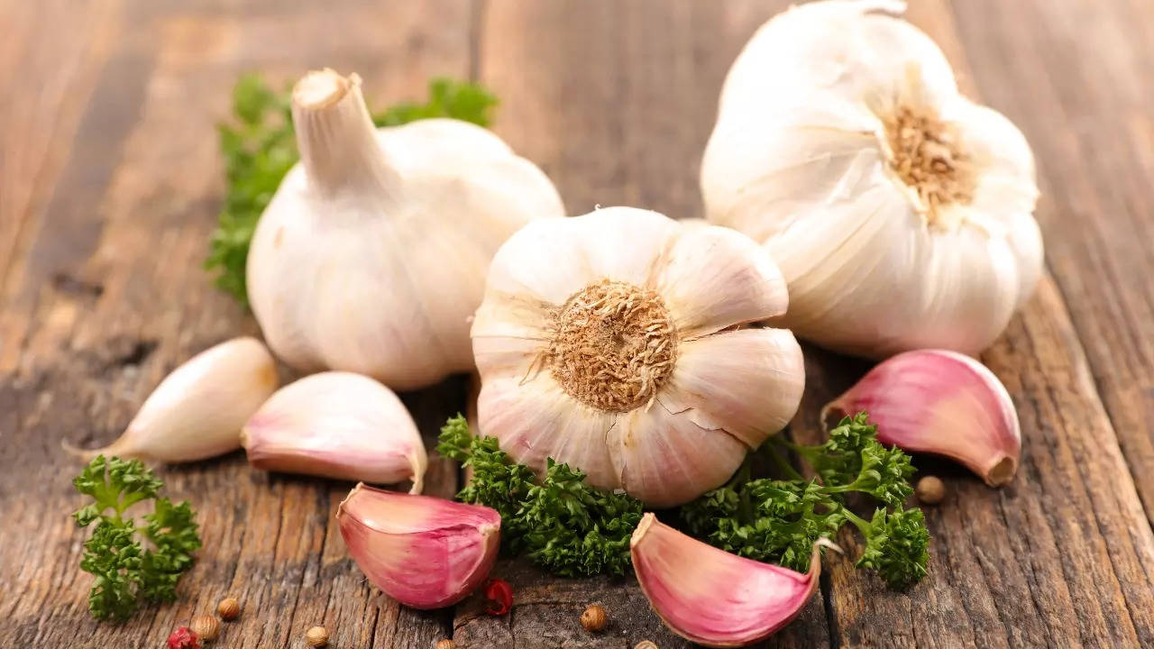 5 ways to use garlic for effective weight loss - Times of India