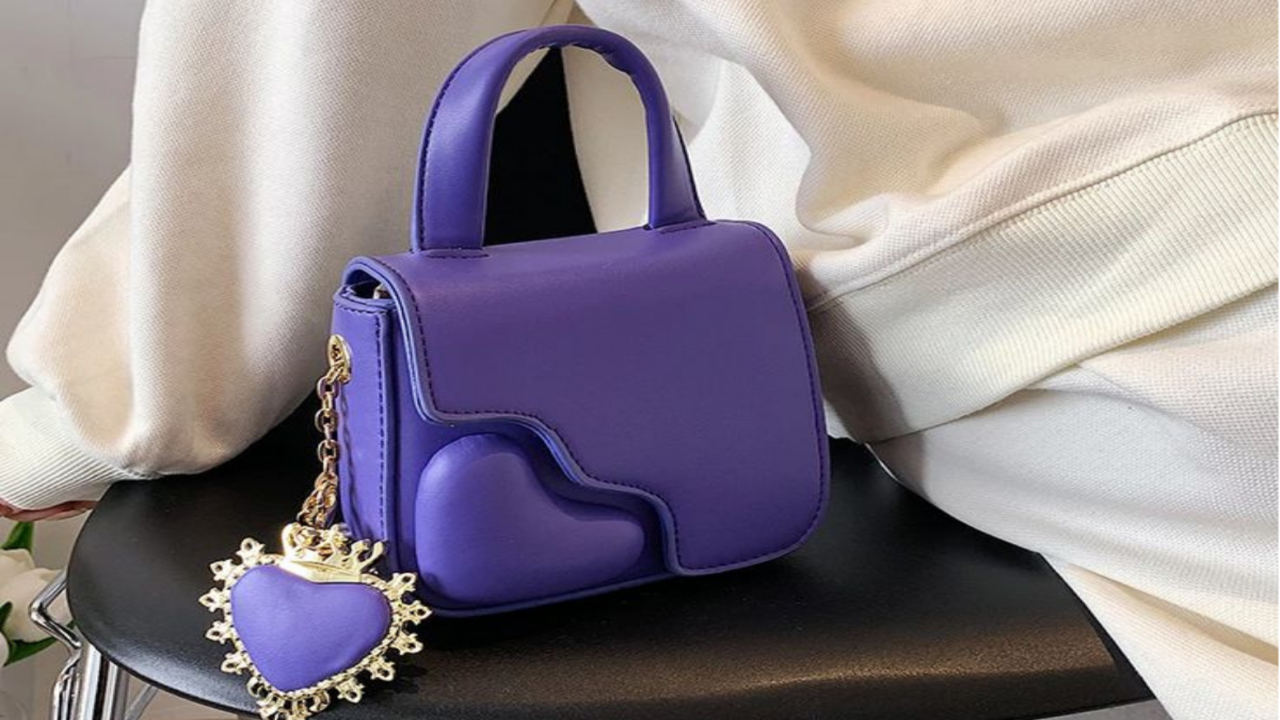 Buy & Shop Women Luxury Designer Hand Bags Online at Ogaan.com