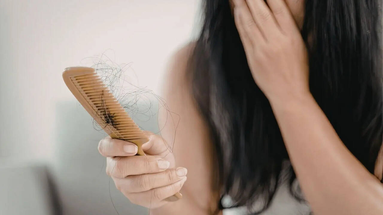 You're losing hair more than usual? It may not be stress: Early signs of  deficiency people ignore | - The Times of India