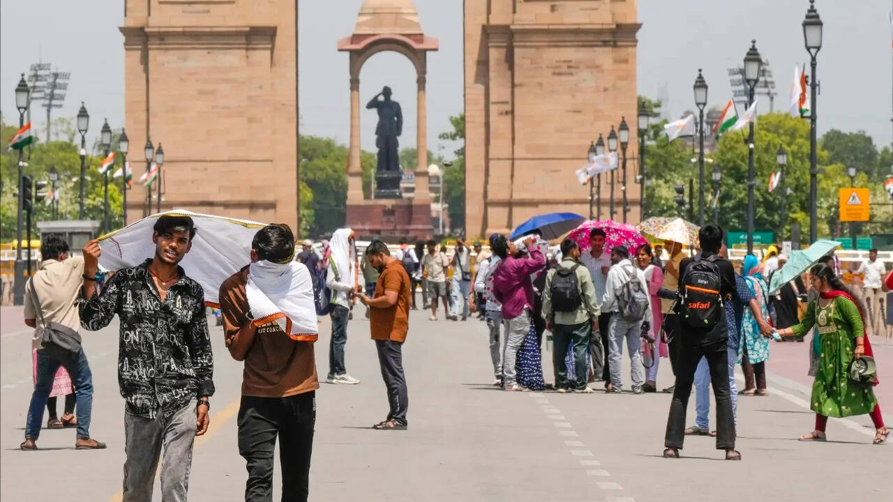 <b>India bakes under record heat as UN warns five more years of climate extremes</b>