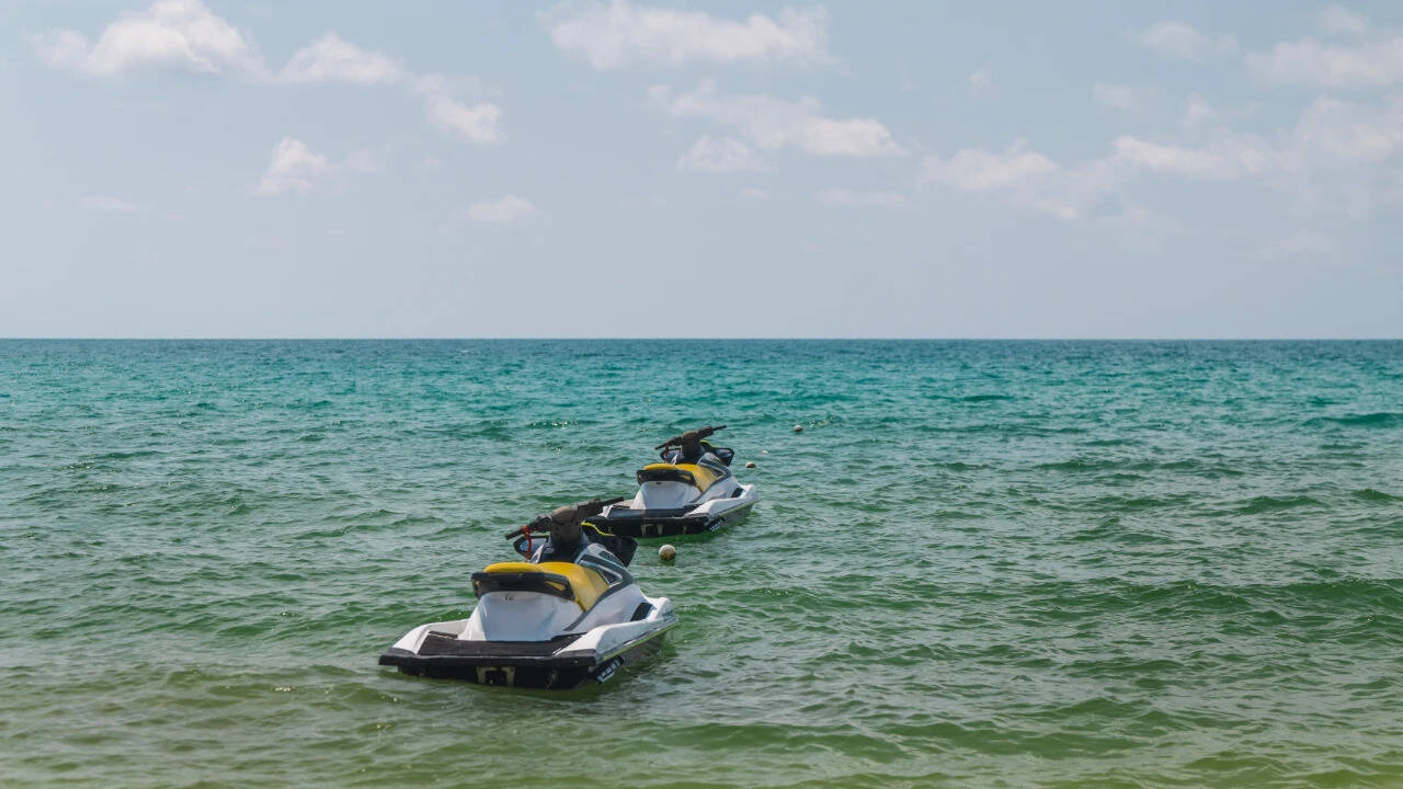 French father, 50, and his sons, 5 and 7, stranded at sea overnight after jet ski capsizes off Ko Samui; family rescued after terrifying hours in the water