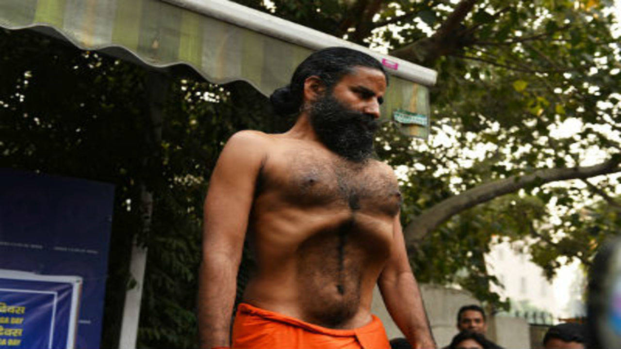 Baba Ramdev offers 'yoga treatment' to rid Haryana of protests | The Times  of India