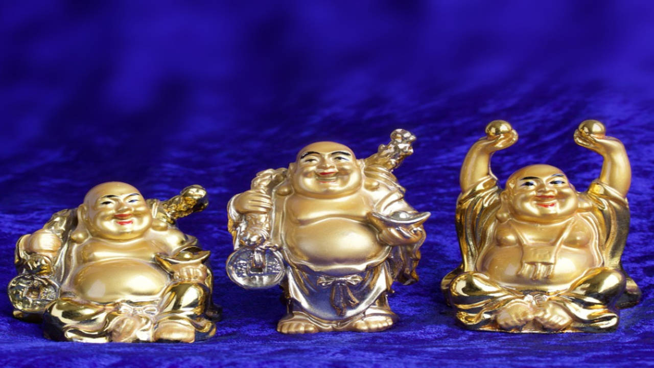 Laughing buddha statues hi-res stock photography and images - Alamy