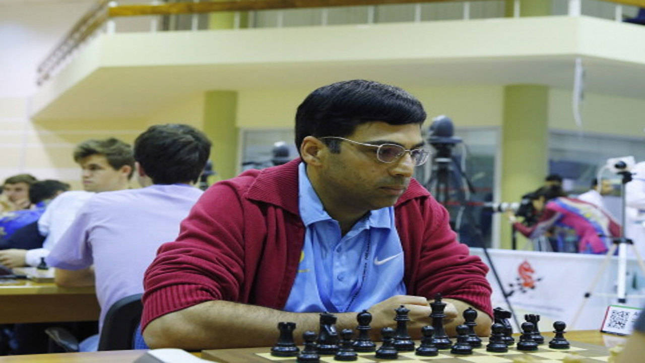 Defending World champion Viswanathan Anand, from India, contemplates his  next move during the eighth game of the Chess World Championship between  him and Russia's Vladimir Kramnik in the Art and Exhibition Hall