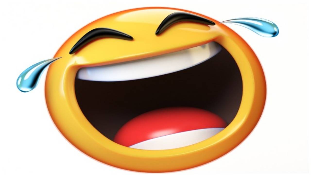 Laughing Emoji - what it means and how to use it.