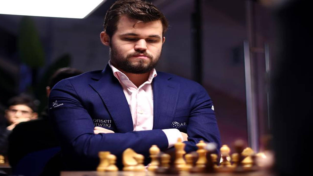 Chess: Carlsen draws final classical game as world champion against Howell, Magnus Carlsen