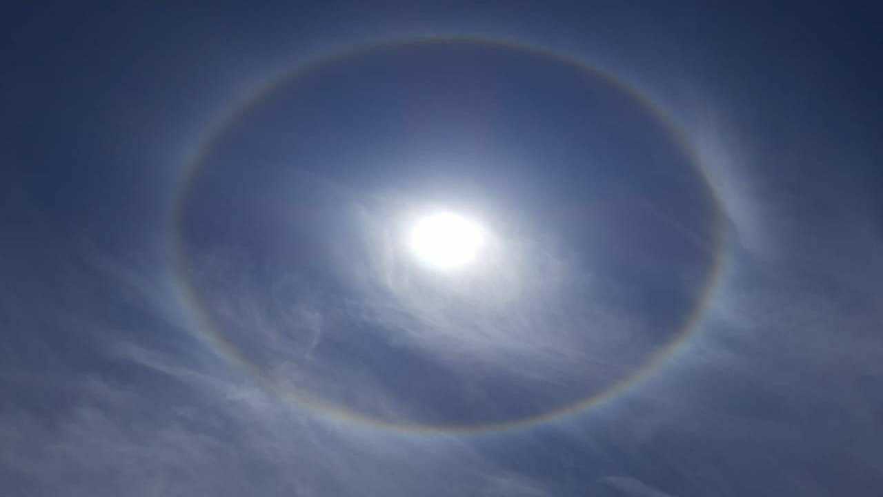 Beautiful sun halo phenomenon with circular rainbow, solar halo the ring  Stock Illustration | Adobe Stock