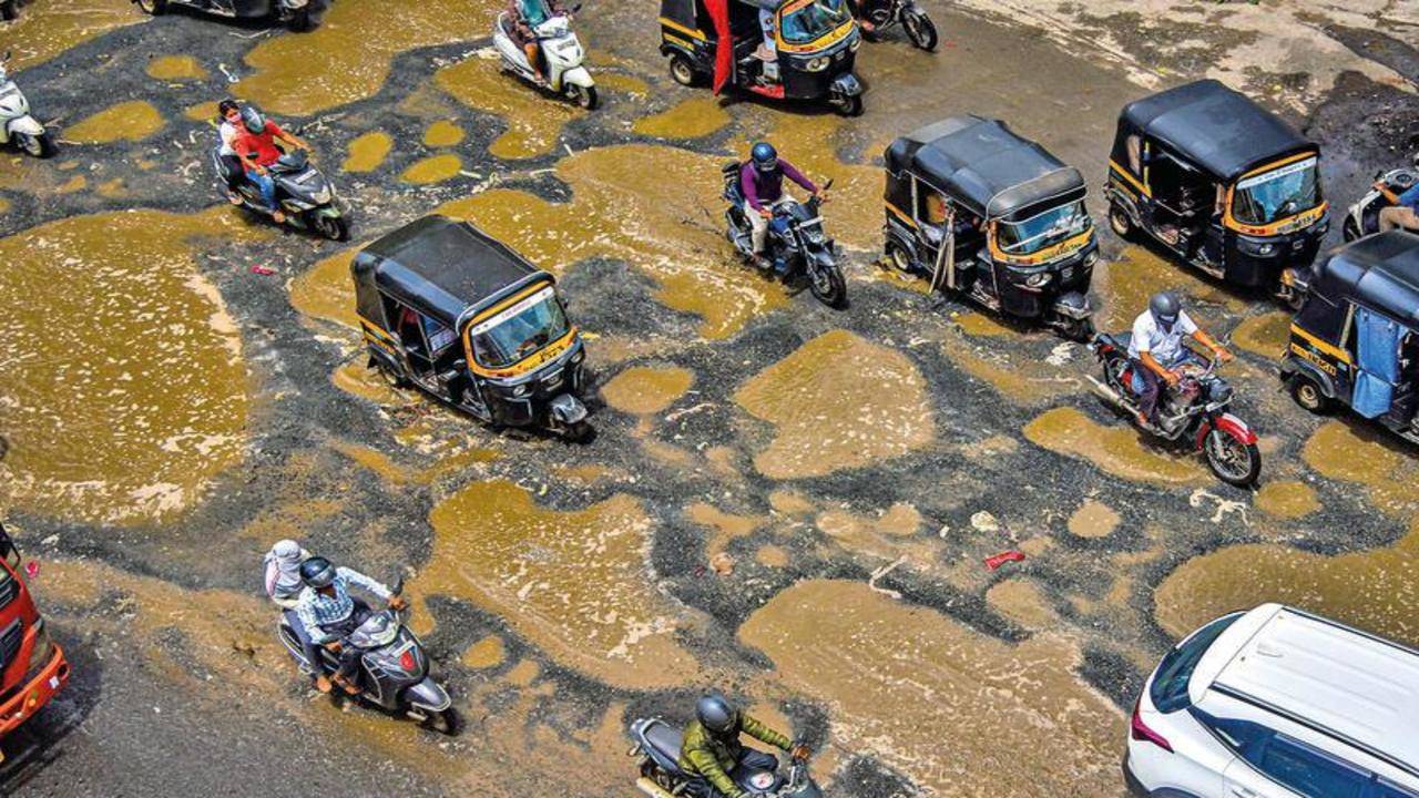 More potholes scar Mumbai roads this year; mix used to fix craters 'washes  away' | Mumbai News - Times of India
