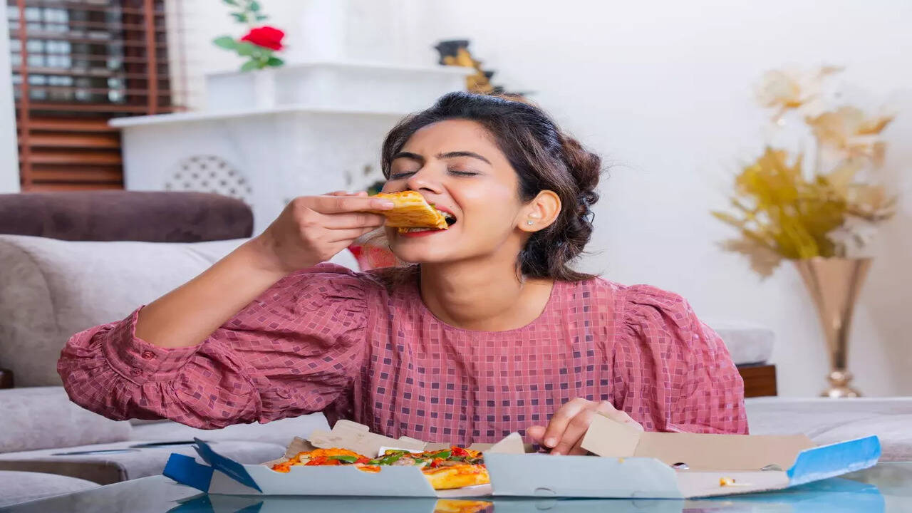 Are you food fidgeting? Know what it is and how it's secretly harming you |  The Times of India