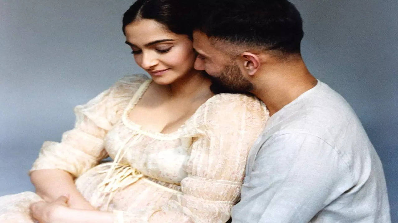 Preggers Sonam Kapoor is a vision in white in mother Sunita