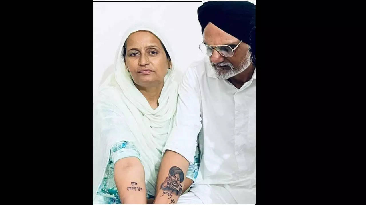 Murdered Singer Sidhu Moose Wala's Father Gets Son's Face Tattooed On Arm