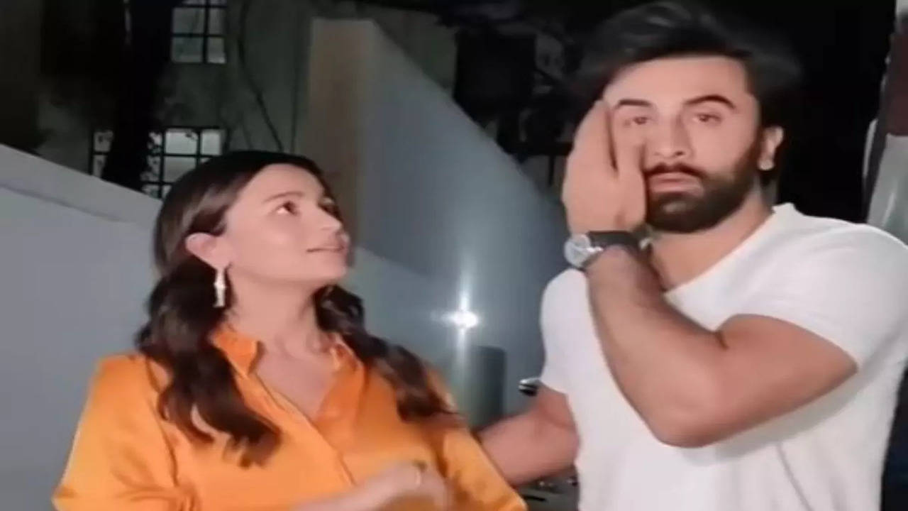Alia Bhatt tries to fix Ranbir Kapoor's hair, he pushes her hand away.  Watch